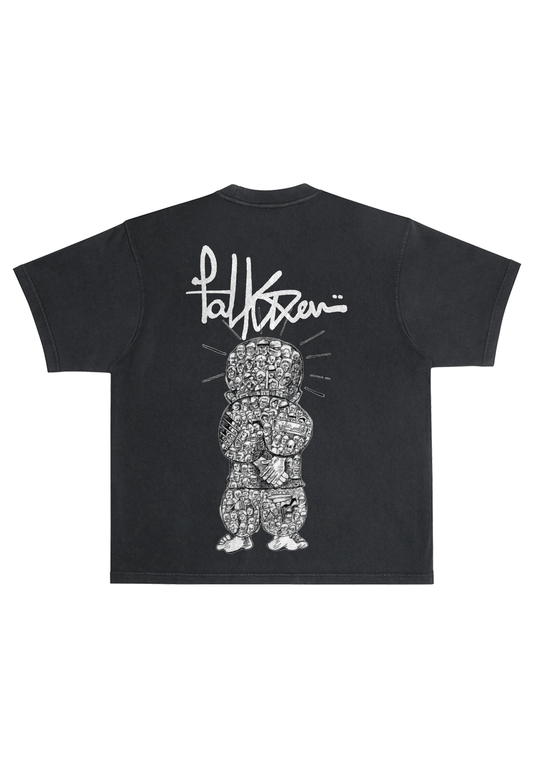 Black heavyweight tee with a graphic print on the front featuring a character illustration.